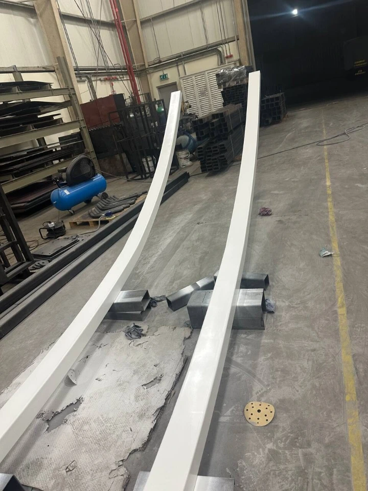 Curved steel workshop view