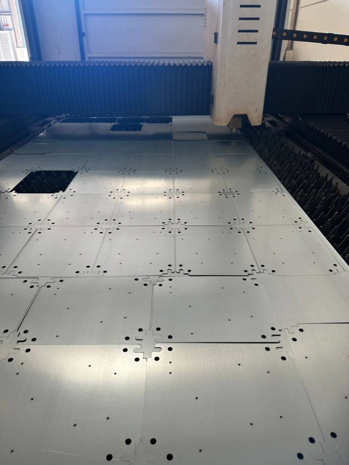 Nested sheet laser cutting