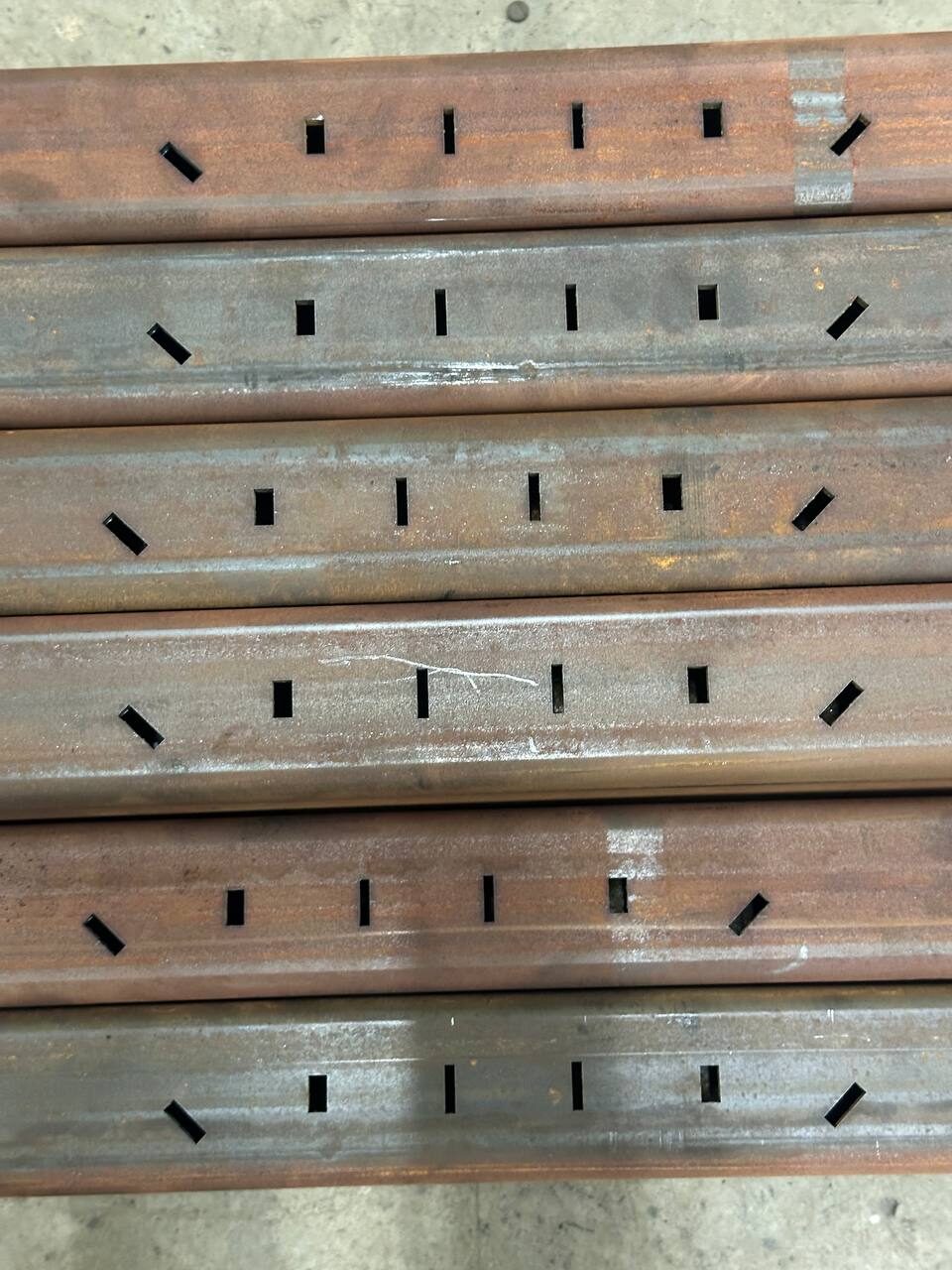 Precision cut tube slots