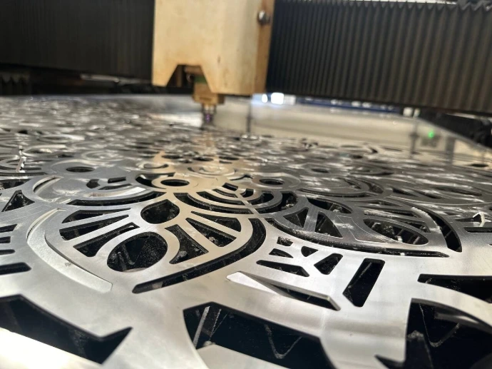 A decorative laser-cut steel panel.