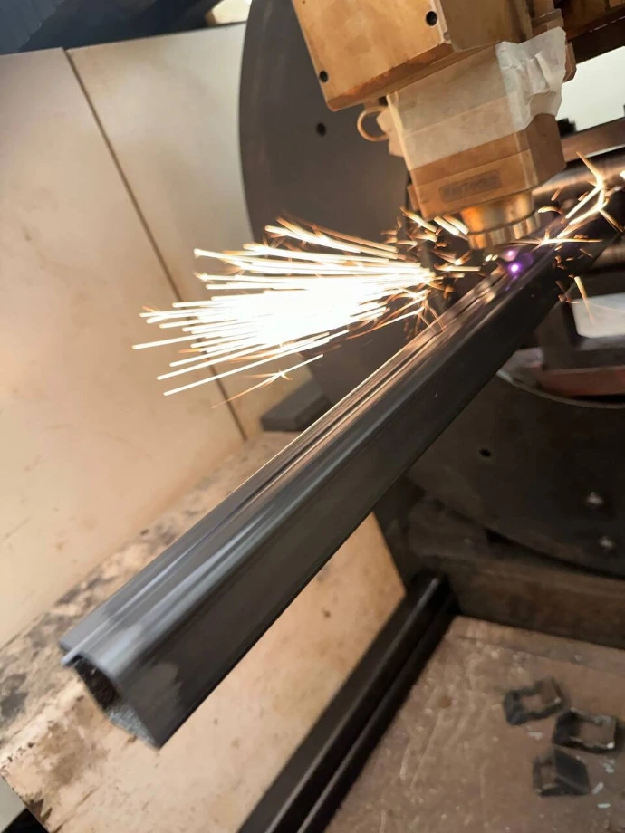 Laser-cut tubular frame components