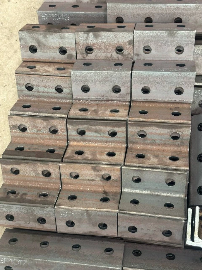 Angled tube ends, coped and cut in a single laser setup.