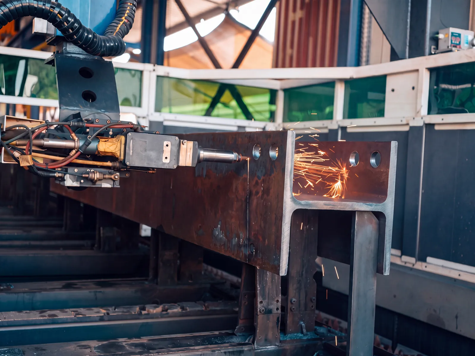Steel H-beam being laser cut at Morshedi, Dubai Industrial City