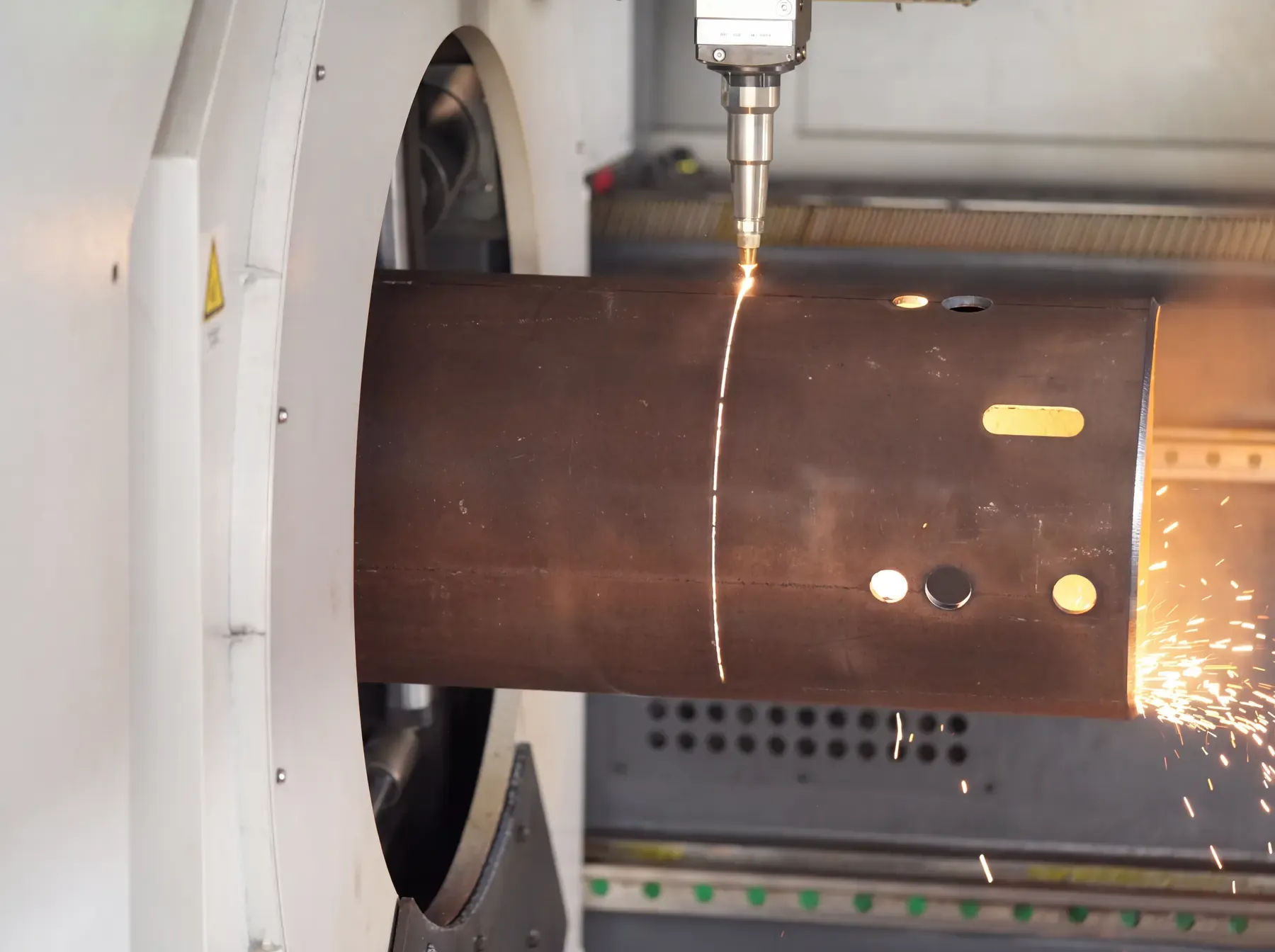 Tube laser cutting holes and slots in a large steel pipe at Morshedi, Dubai
